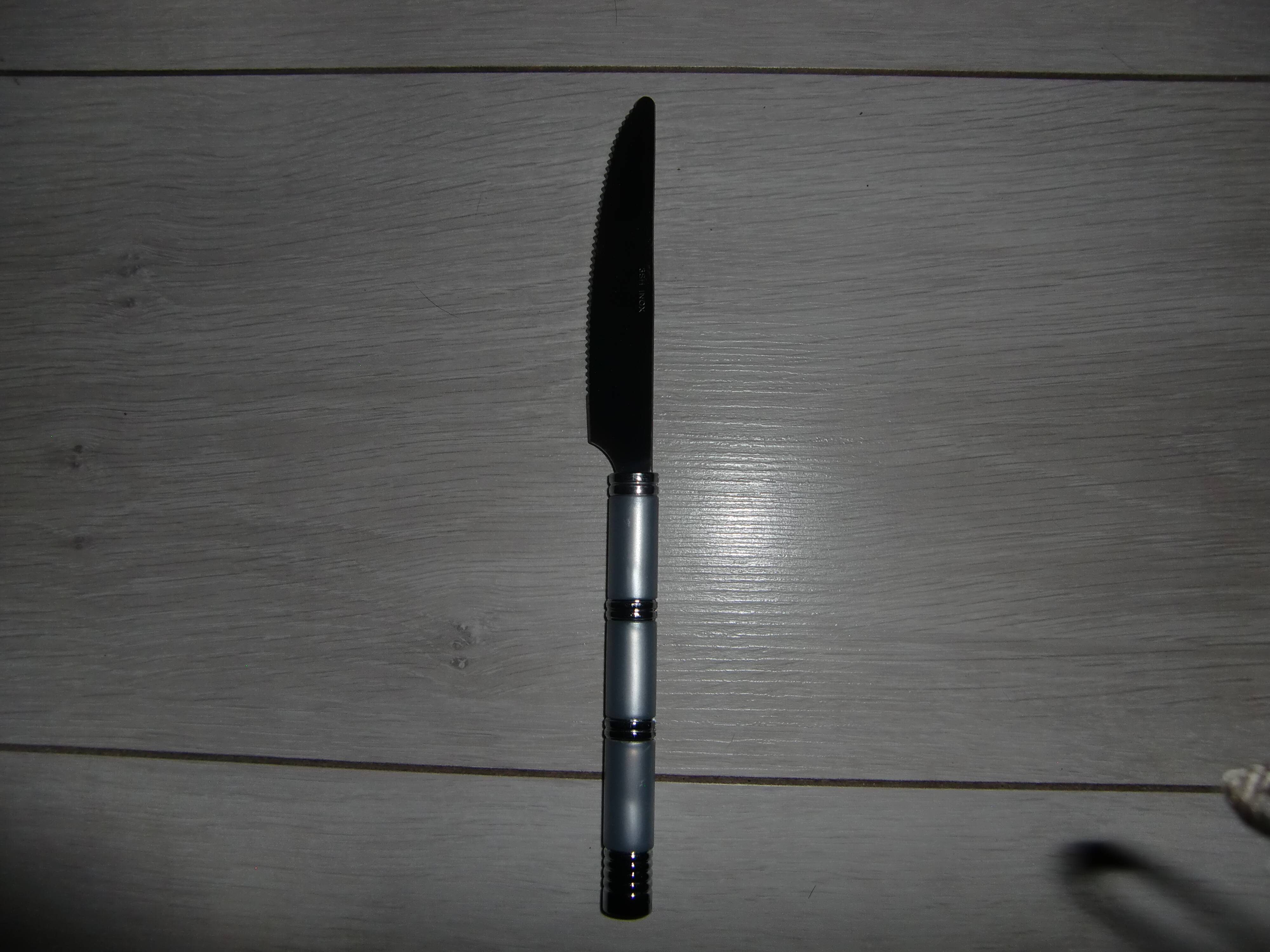 24-piece stainless steel cutlery set with pearly handles