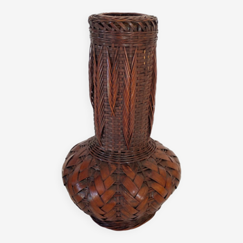 Glass vase and woven straw