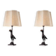 Pair of patinated bronze table lamps depicting a falcon