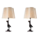 Pair of patinated bronze table lamps depicting a falcon