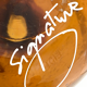 Biot blown glass amber bottle