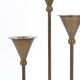 Trio of brass candlesticks by Christian de Beaumont