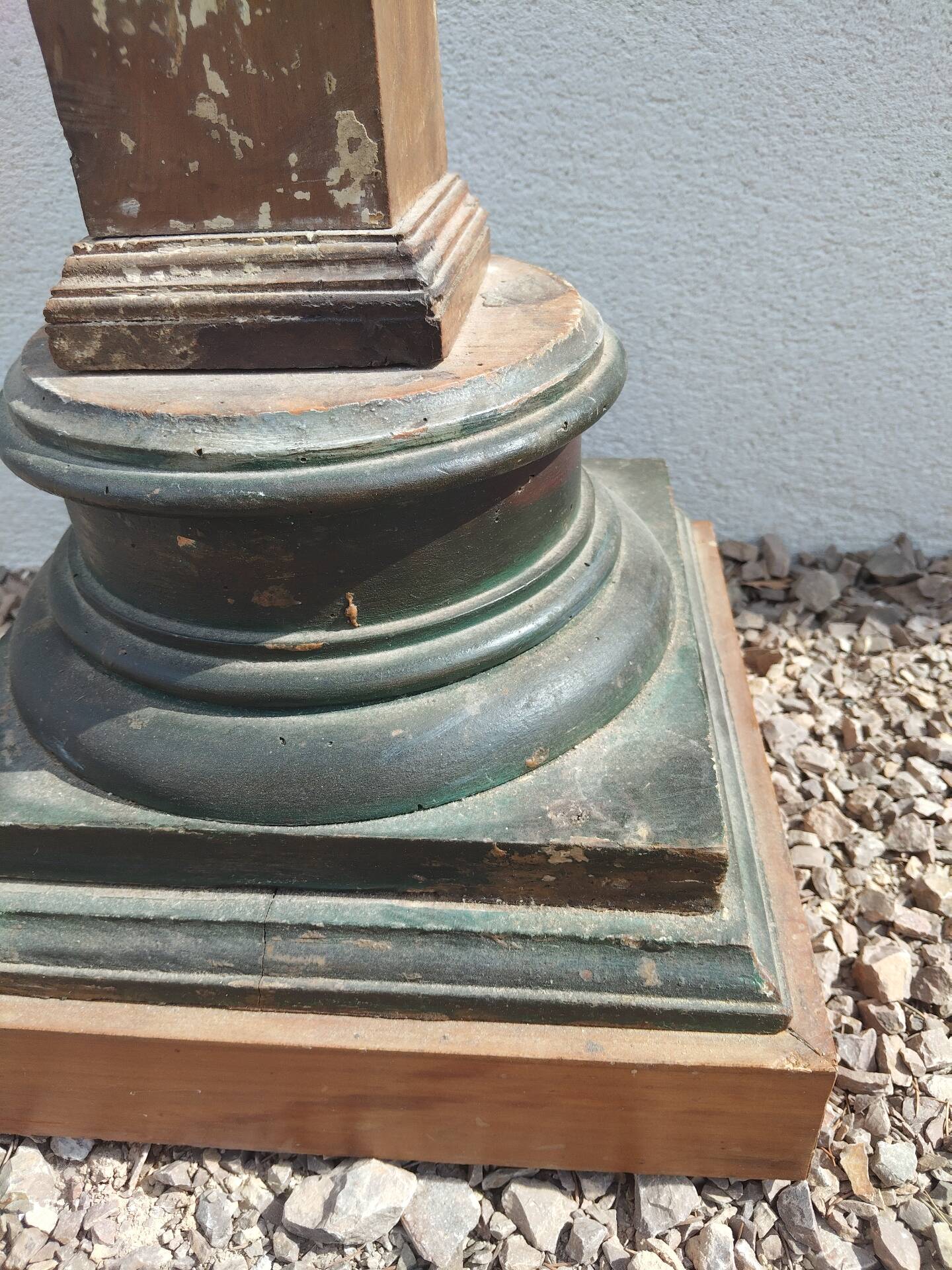 Large antique church candlestick in carved wood transformed into a lamp.