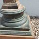 Large antique church candlestick in carved wood transformed into a lamp.