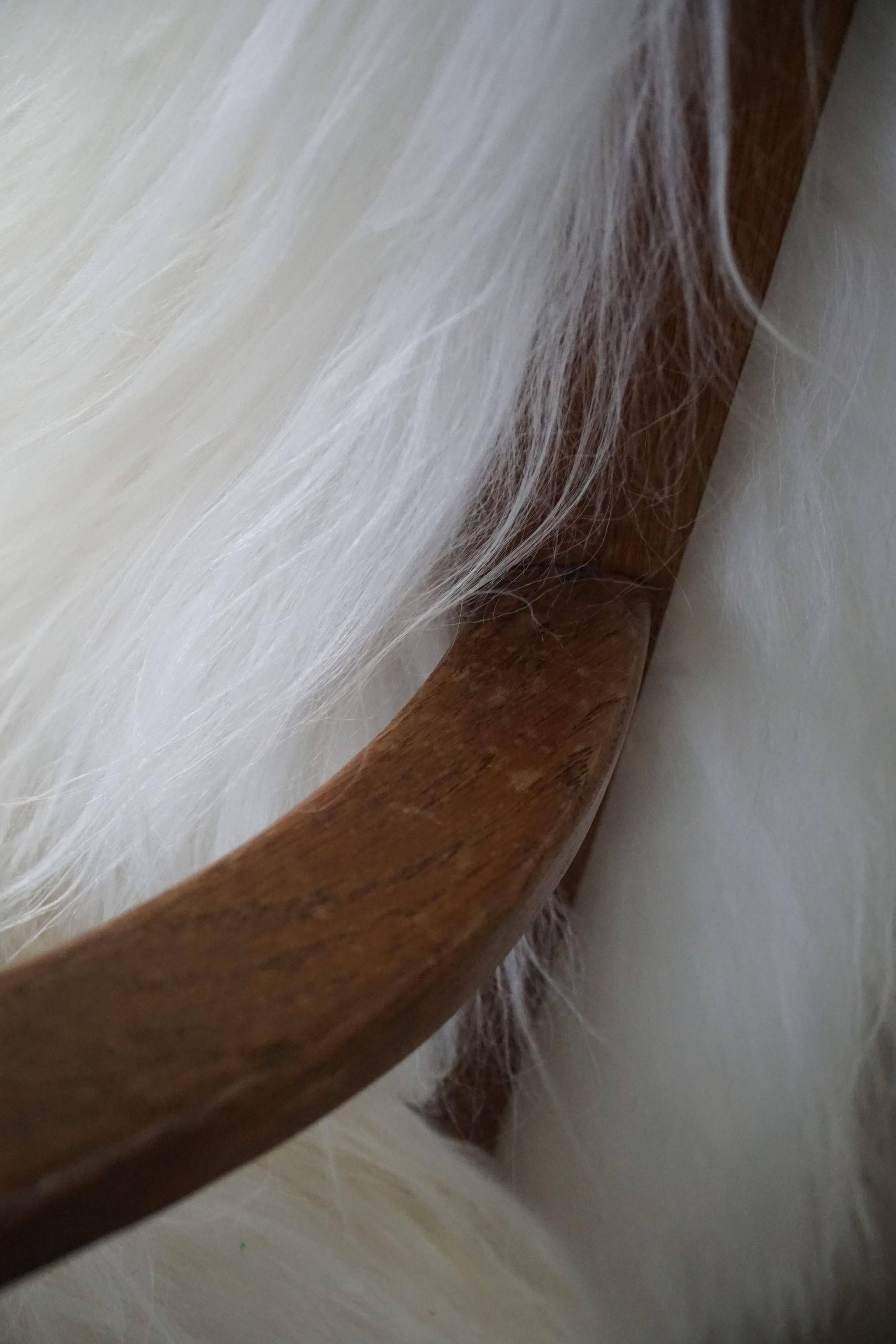 Henning Kjærnulf, armchair reupholstered in long-haired Icelandic sheepskin, 1950