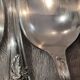 12 silver-plated dessert spoons with rocaille ribbon decoration, 18.5 cm