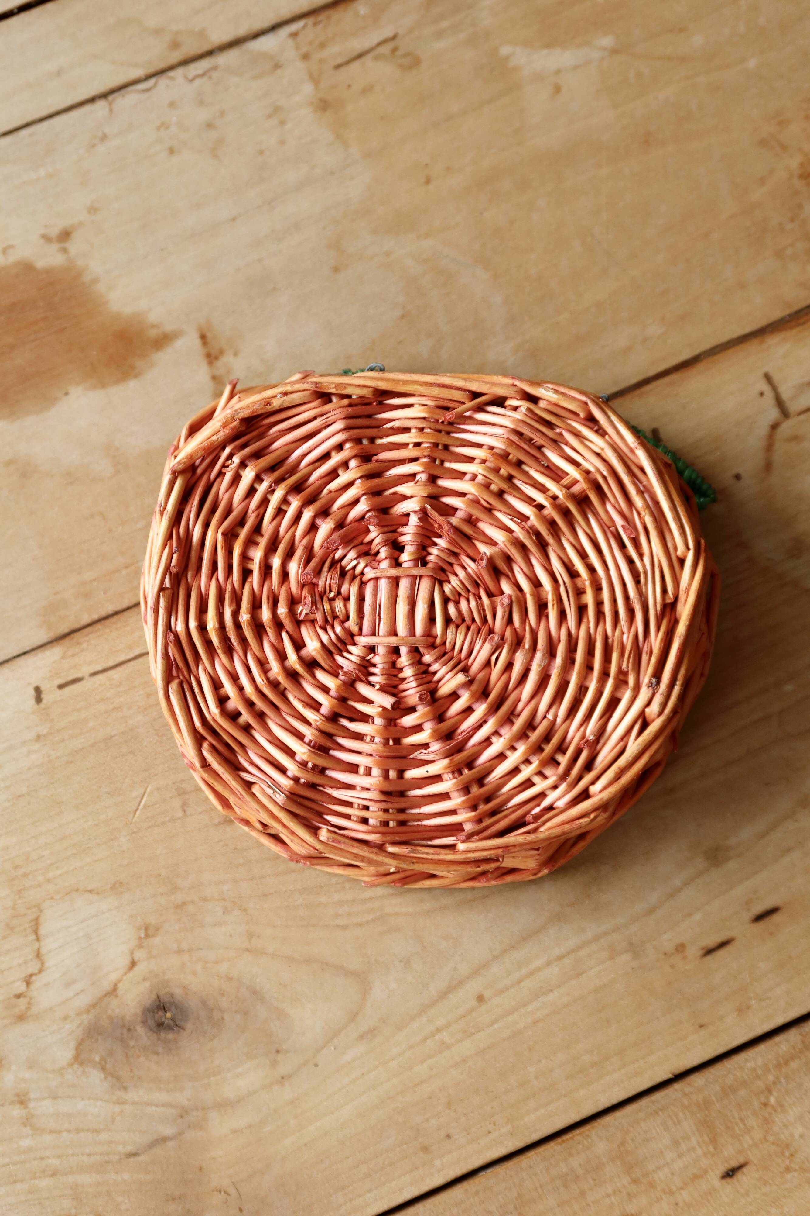 Small vintage wicker baskets in the shape of orange and lemon fruit