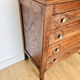 Antique commode with carved relief
