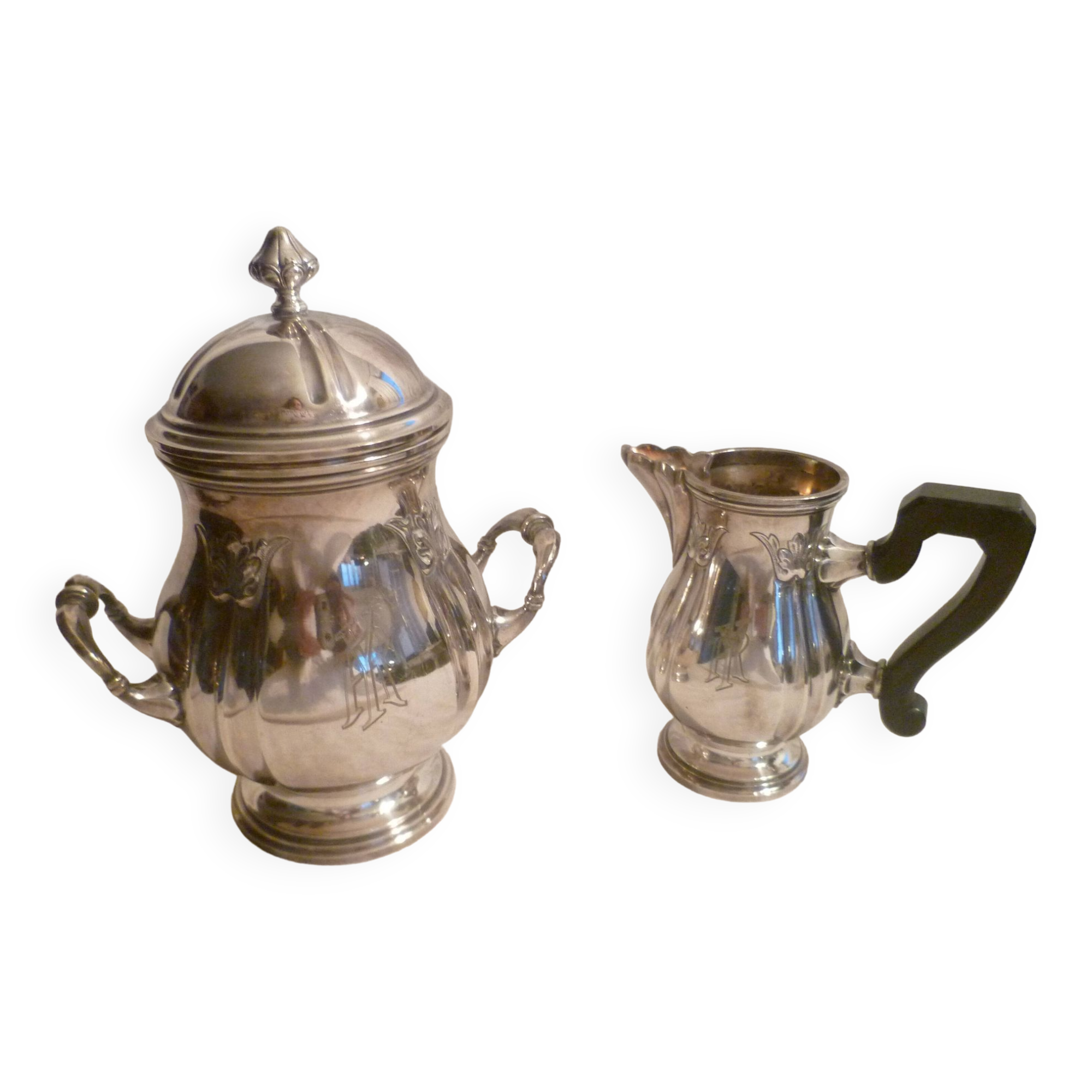 Sugar bowl & its milk pot with ebony handle in silver metal