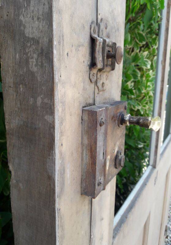 Old glazed door 211.5x105.5cm and its entrance door frame.