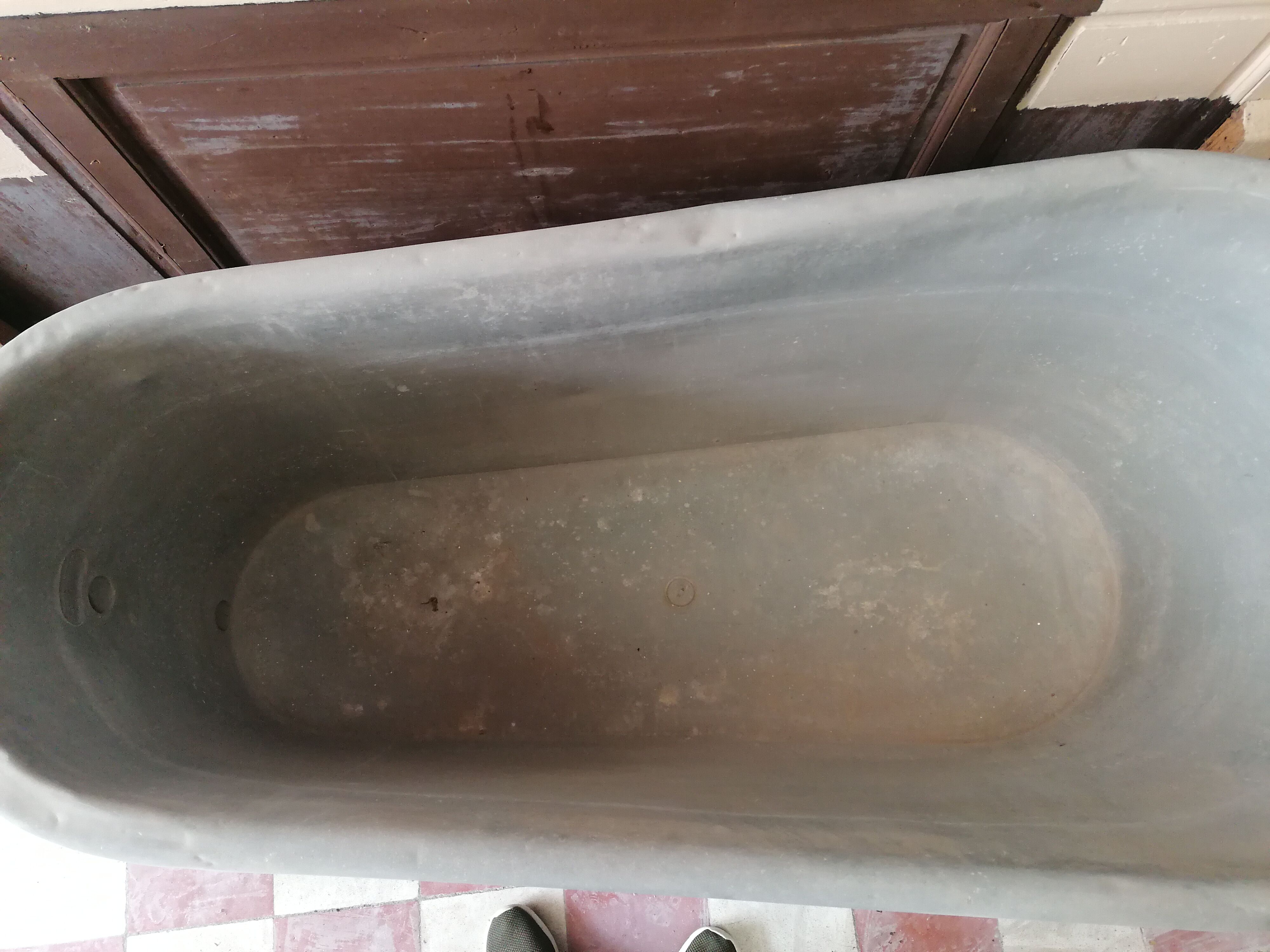 old bathtub with its stove