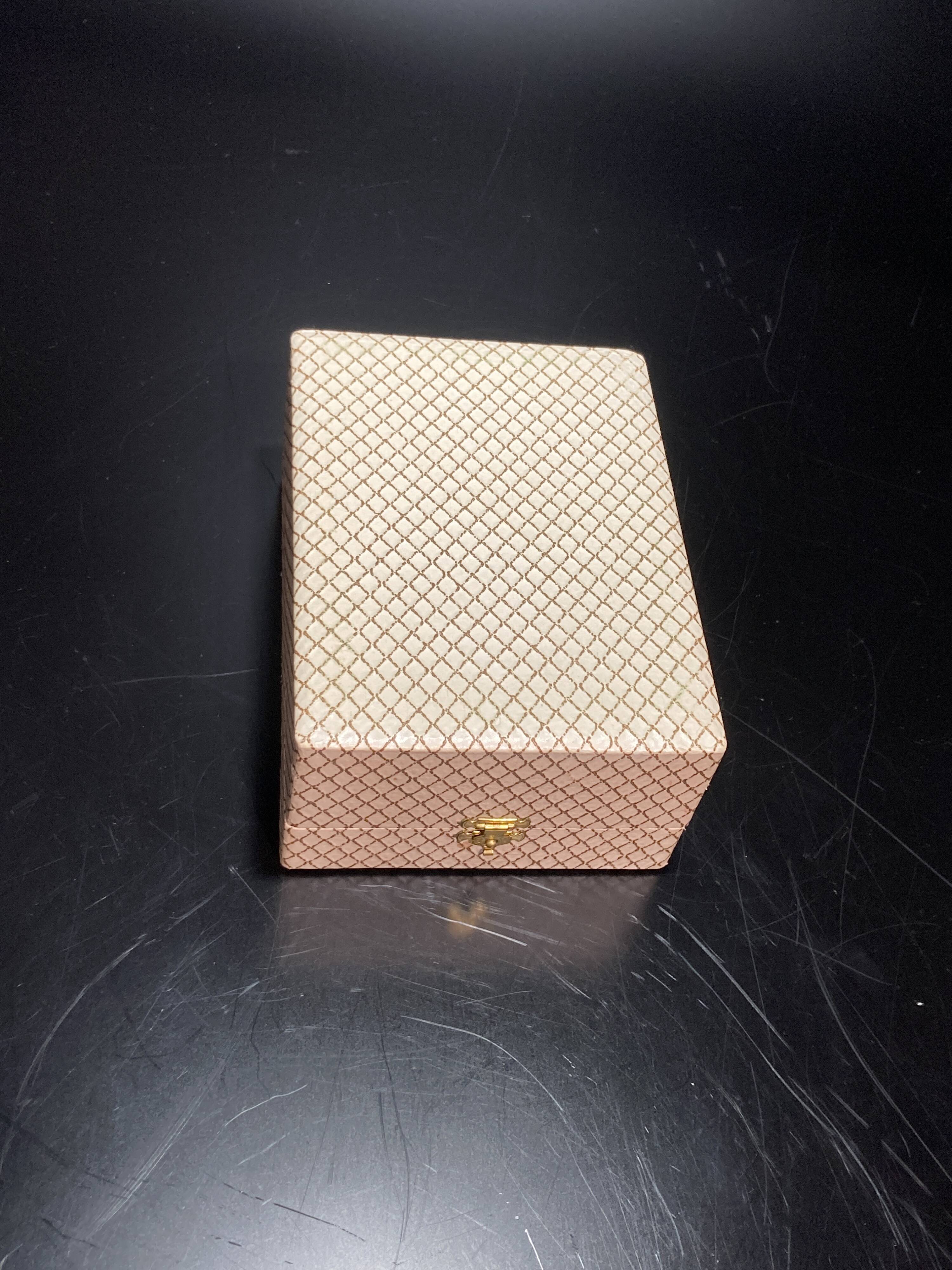 Egg cup with silver metal spoon