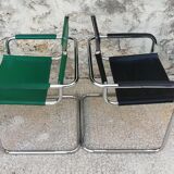 Pair of armchairs, tubular structures and imitation leather