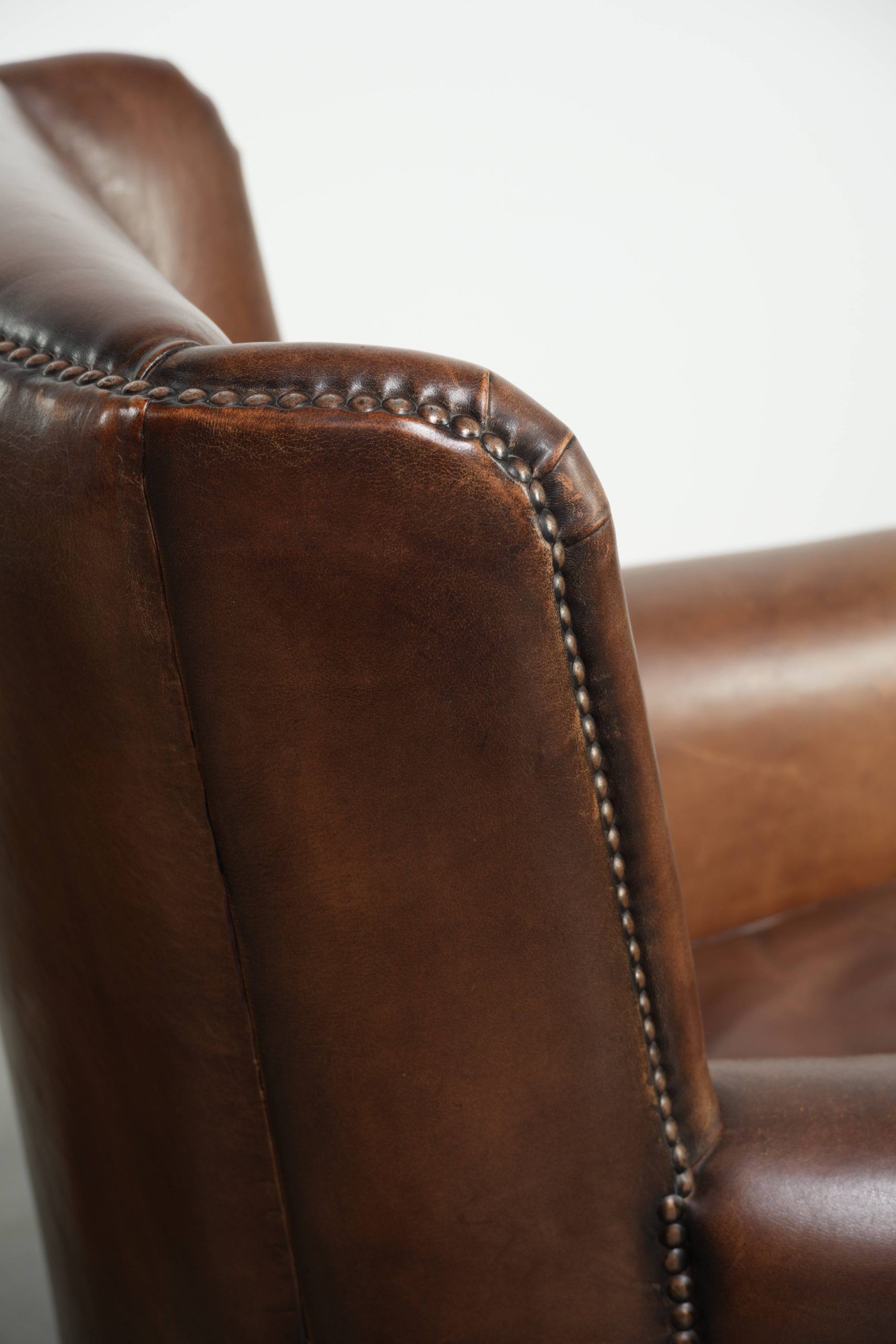 Set of 2 subtle sheepskin wingback armchairs in English style