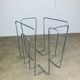 Postmodern magazine rack in grey metal, 1980s.