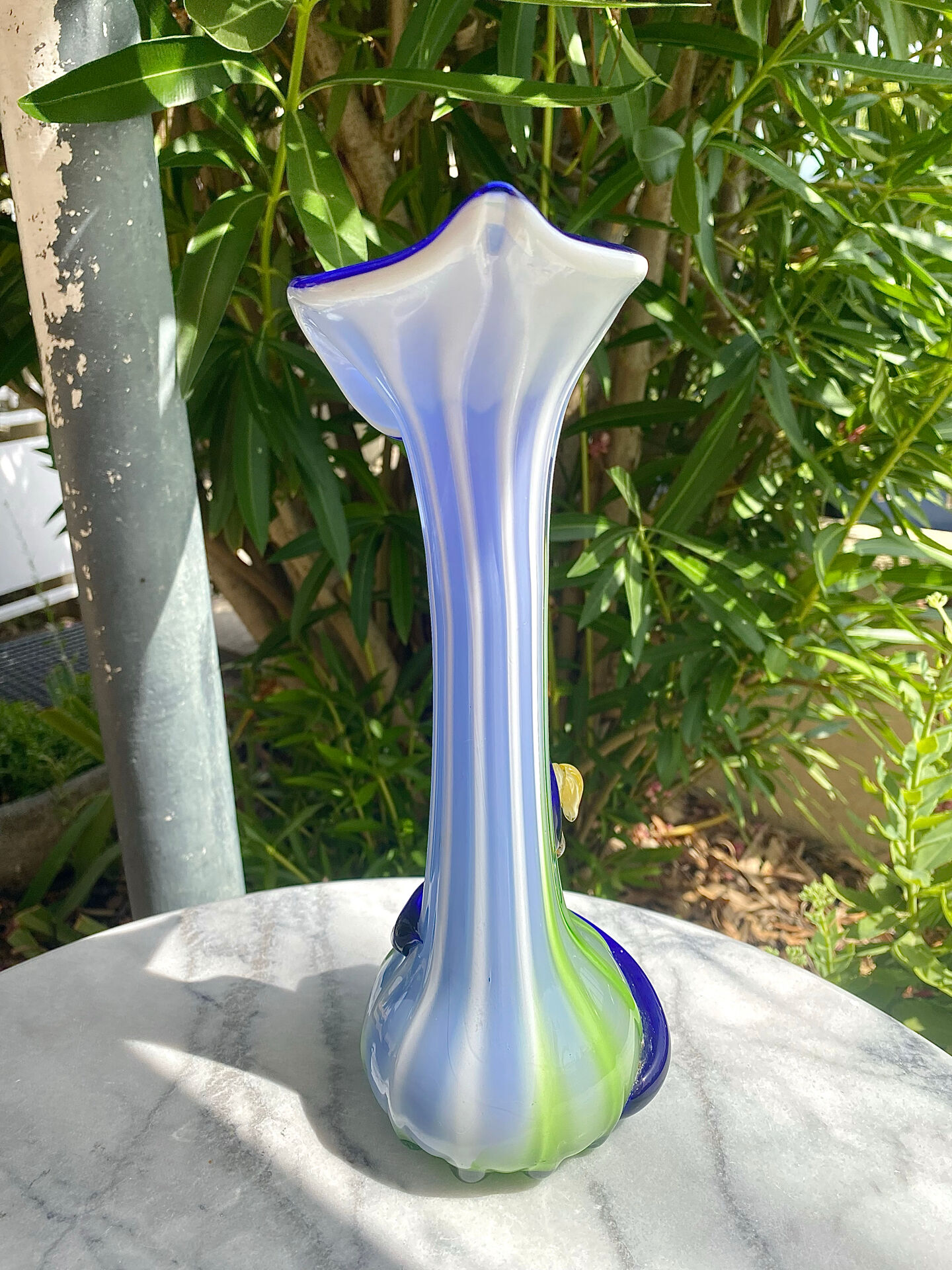Large blown Murano glass vase with floral decoration.