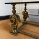 Table basse bronze à tête de chevaux
