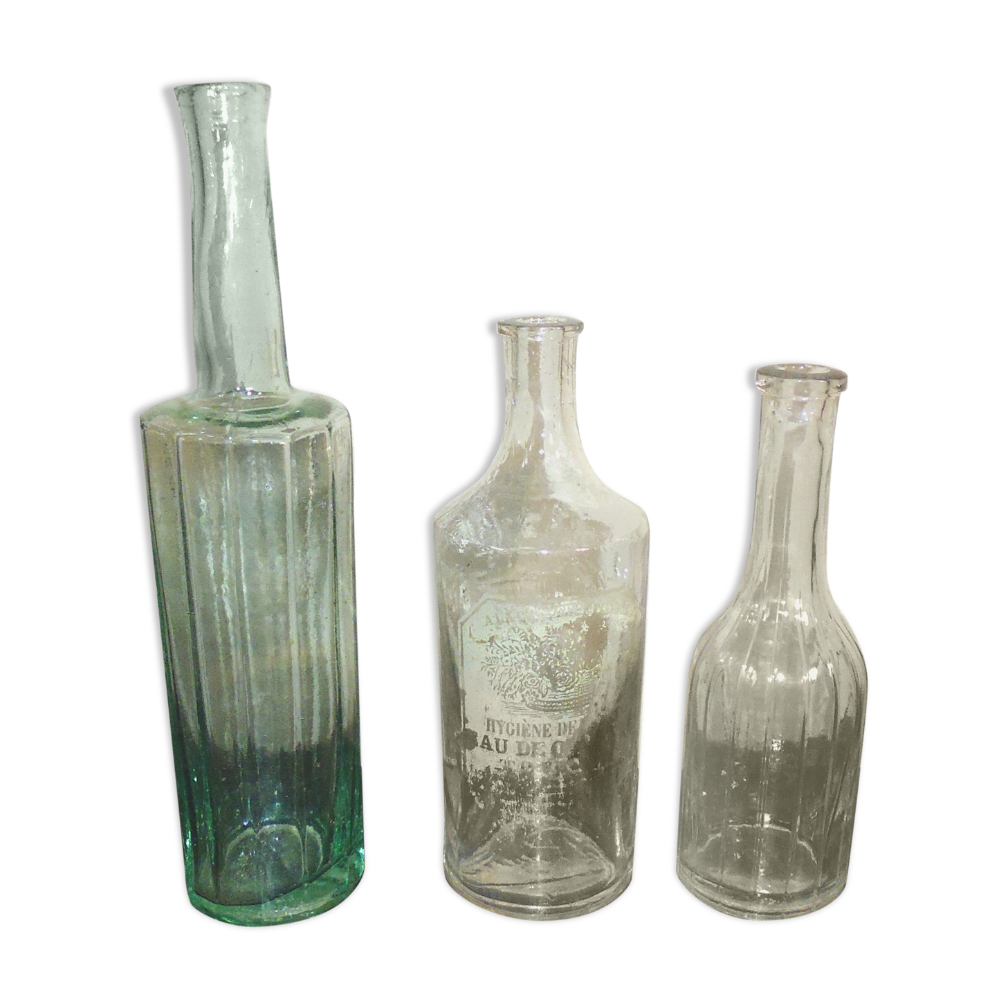 3 old blown glass bottles