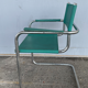 Fauteuil en cuir vert