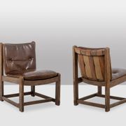 Pair of oak armchairs, upholstered in leather. Work from the 1960s.