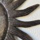 Brutalist metal wall sculpture "sun-moon"