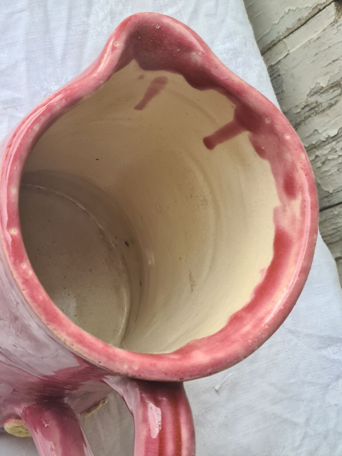 Glazed terracotta pitcher with mimosa decoration