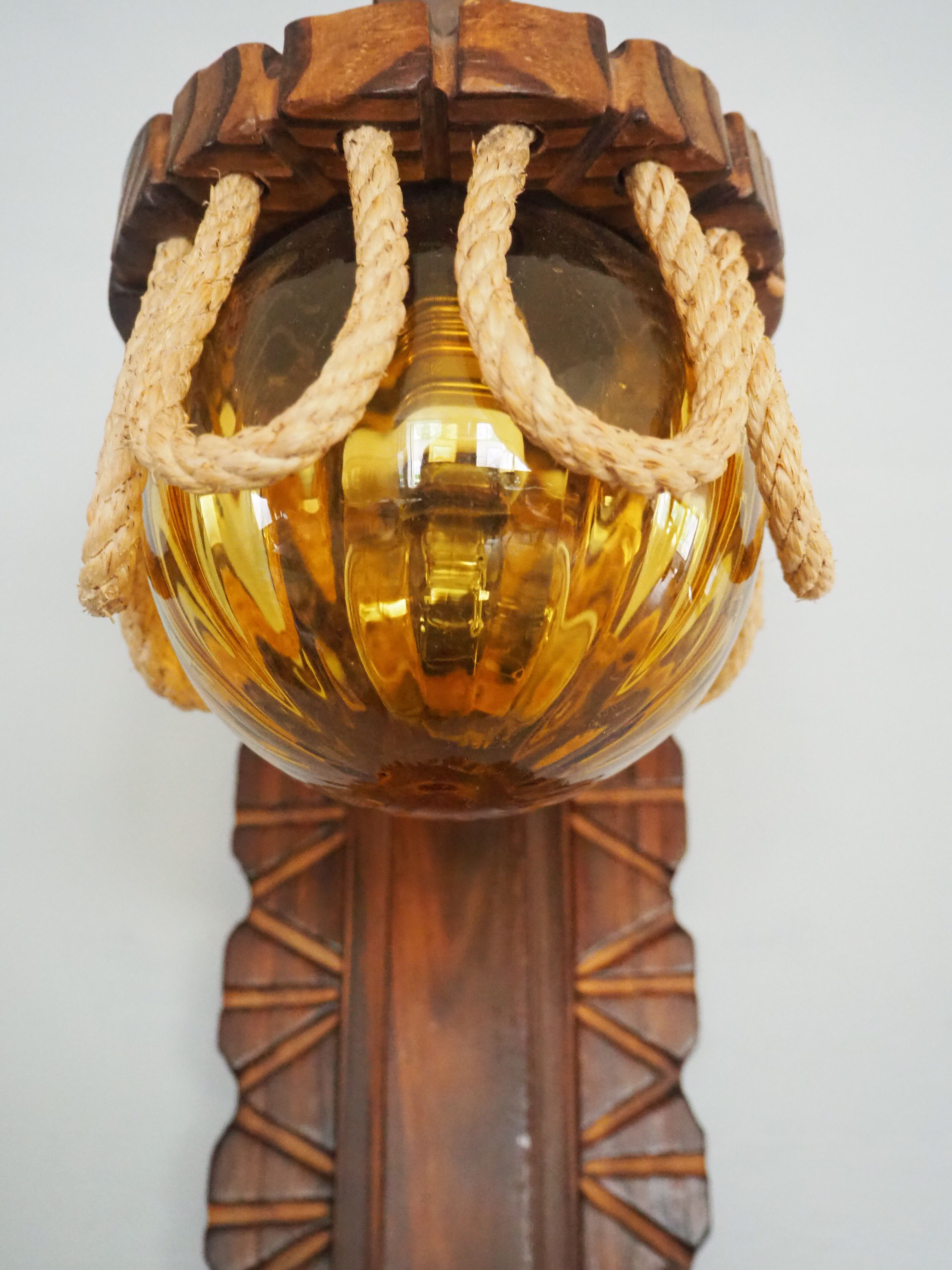 Sconce in wood and yellow glass ball from the 1960/1970