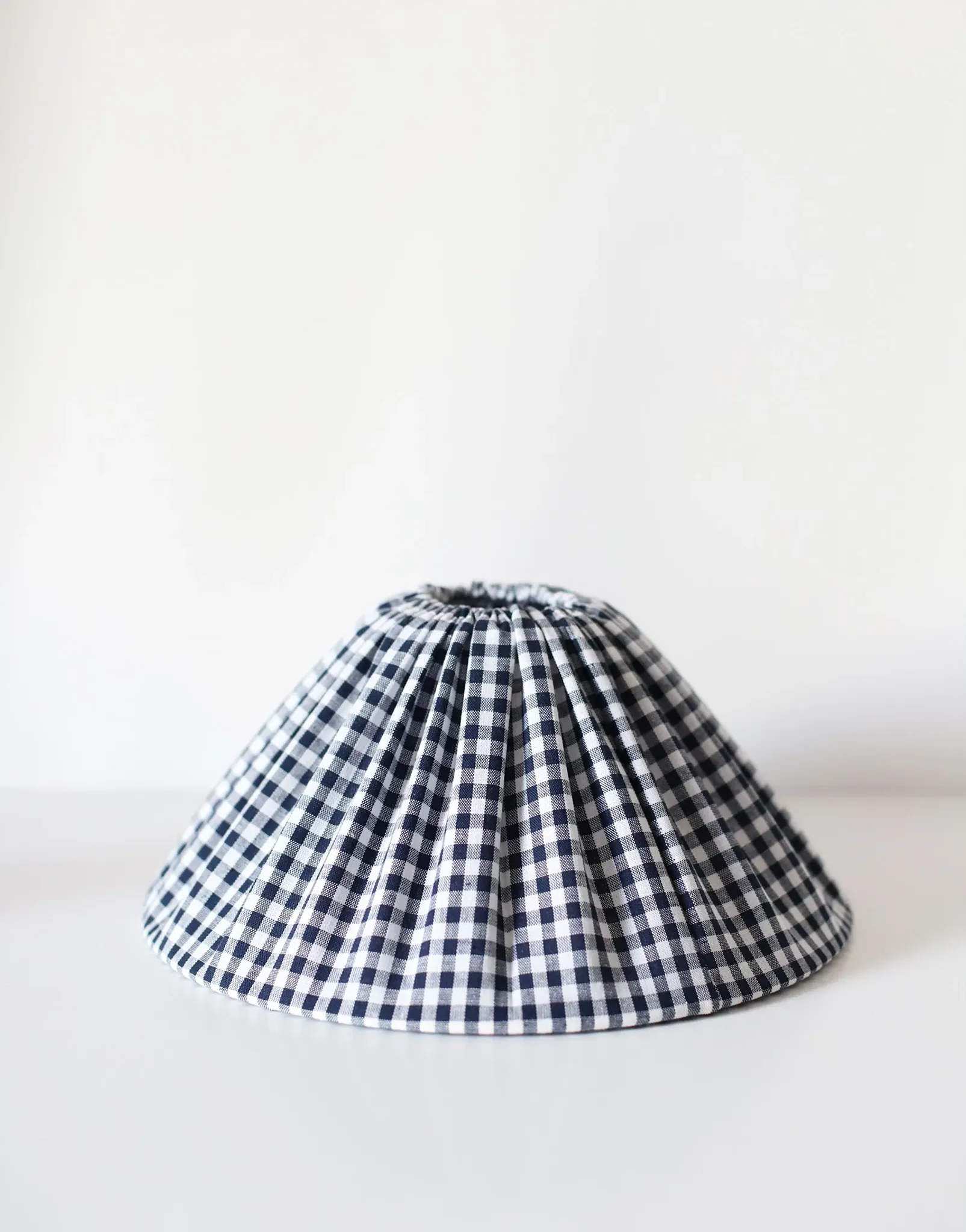 Vintage table lamp Hautlalampe: blue Alsace stone base and pleated Vichy shade.