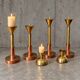 4 x Large / weighty postmodern candles / 1970s / two heights 60 - 70 cm / copper - brass