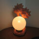 Paire de lampes palmiers en céramique rose saumoné et boule opaline blanche années 70 80