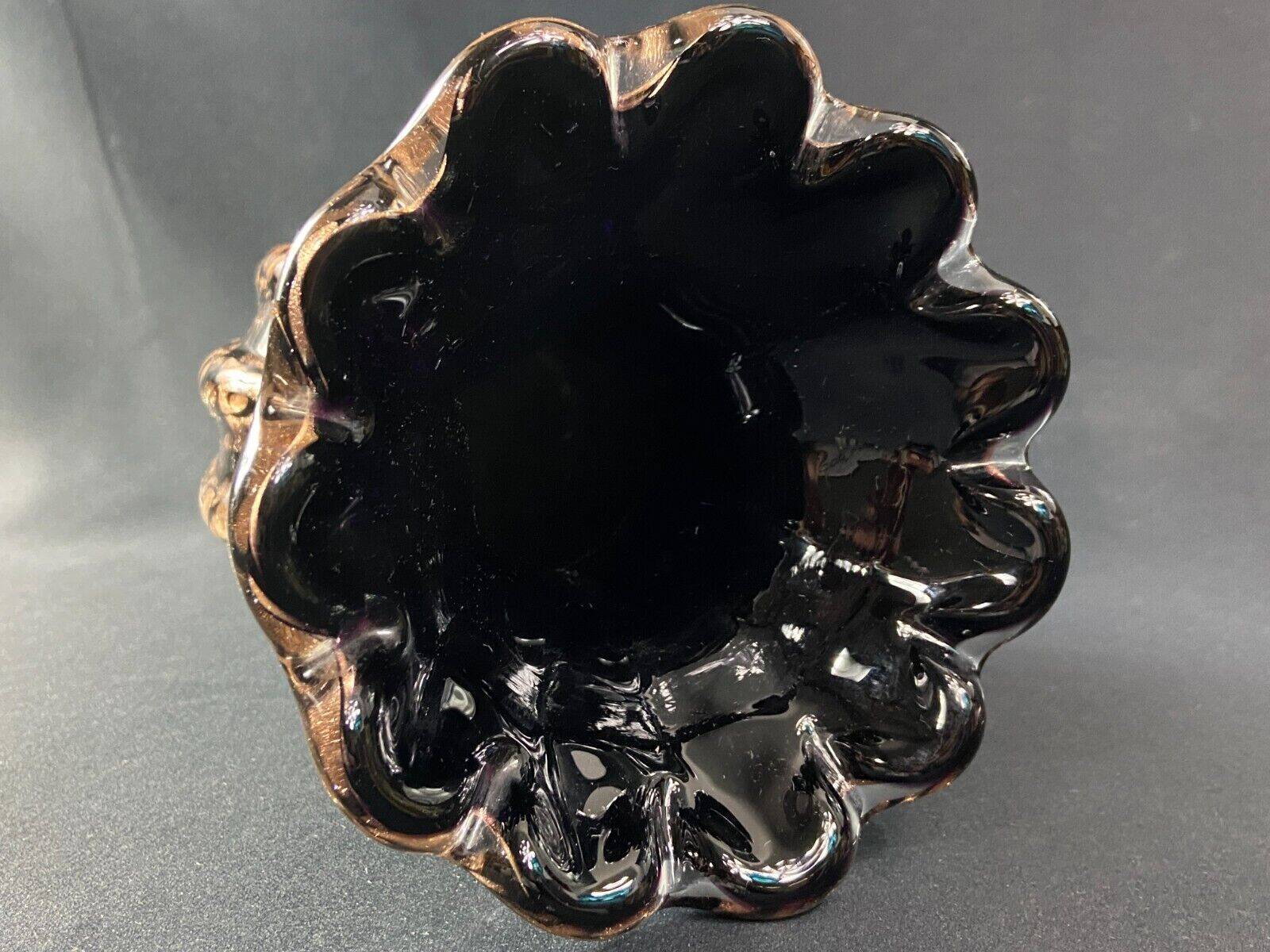 Vase signed in Murano Venice crystal with gold inclusion on a black background