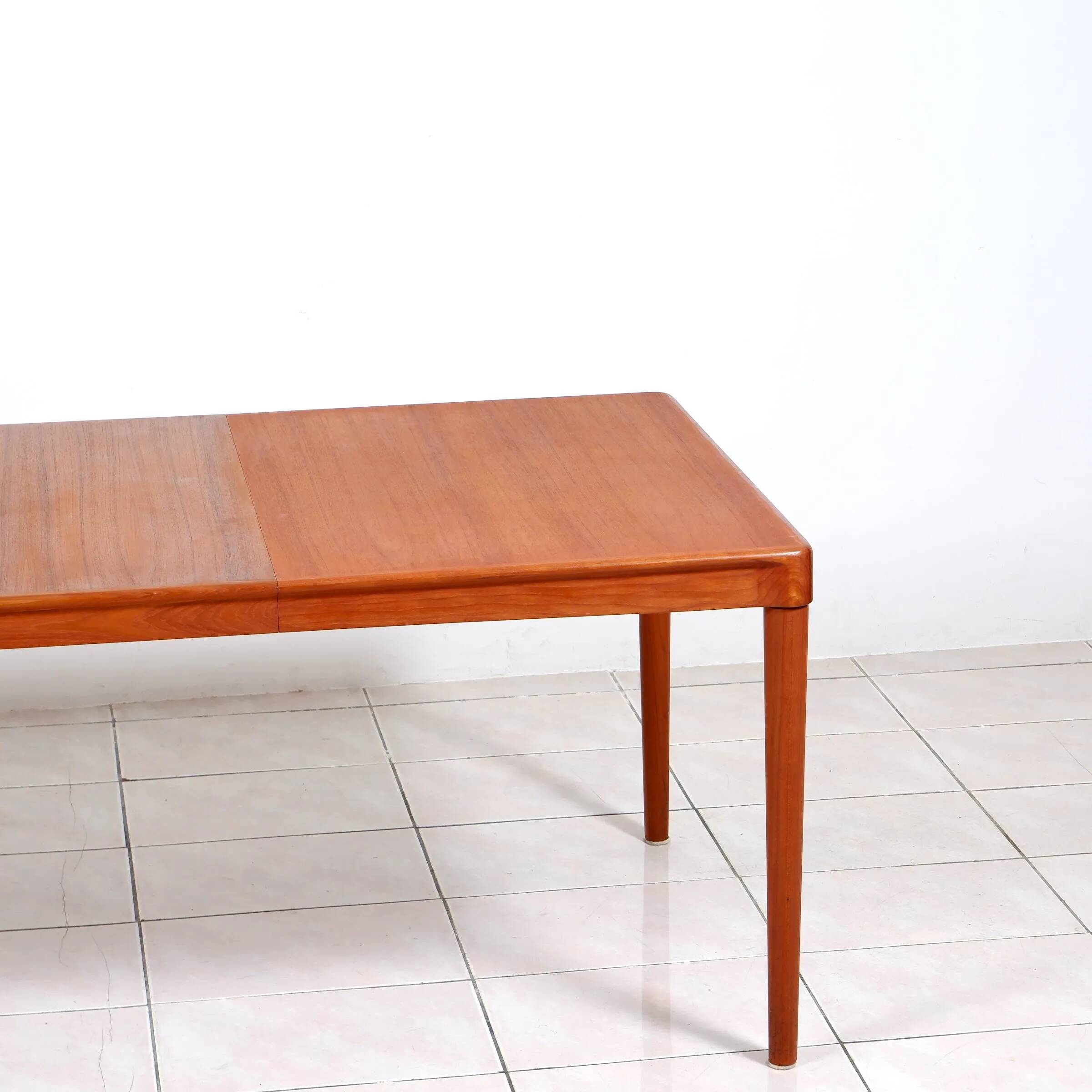 Extendable dining table in teak by H. W. Klein for Bramin Mobler