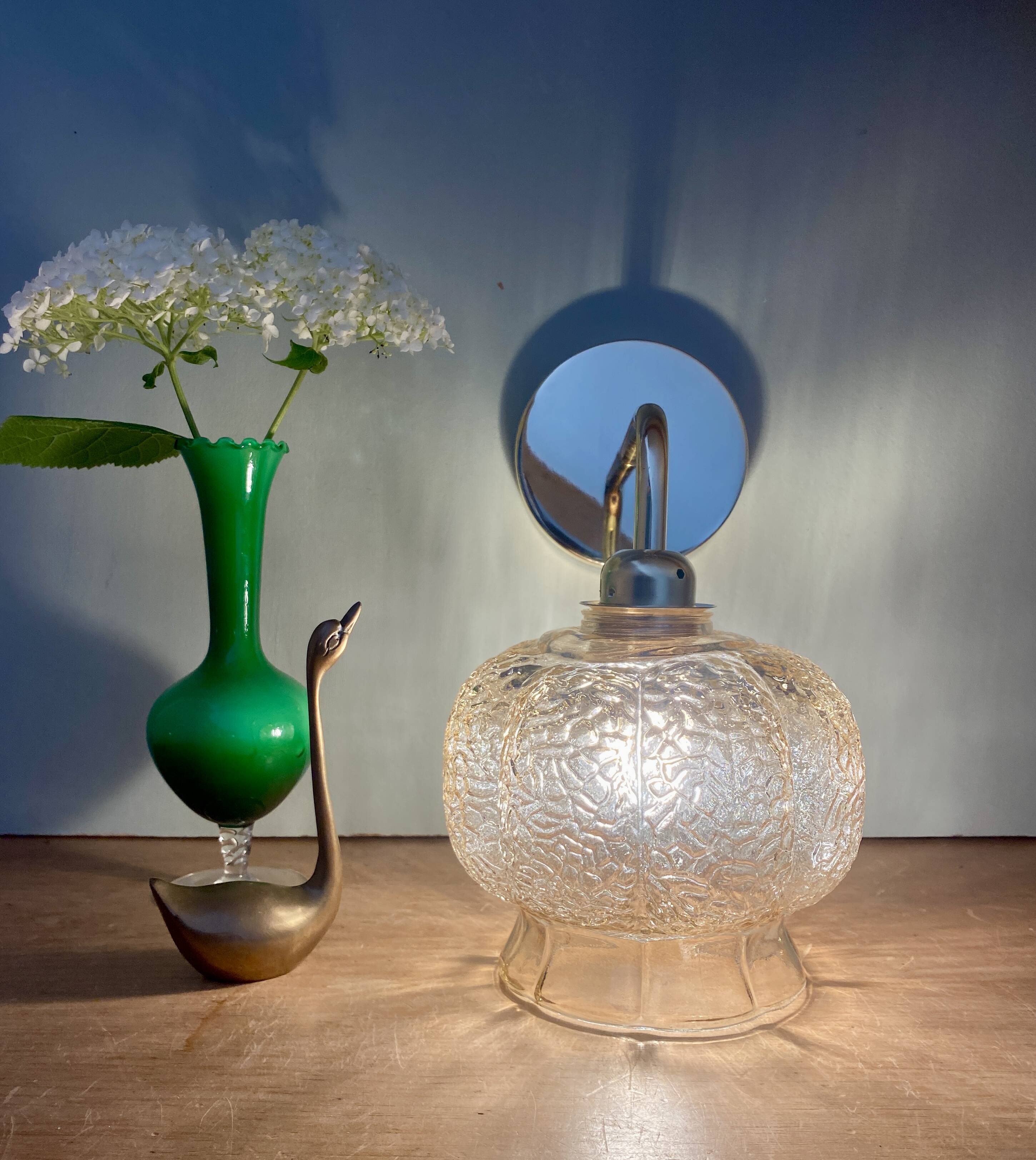 Vintage golden globe angled wall light in amber glass