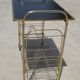 Serving trolley, vinyl record holder in golden brass