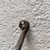 Wall lamp in wrought iron.