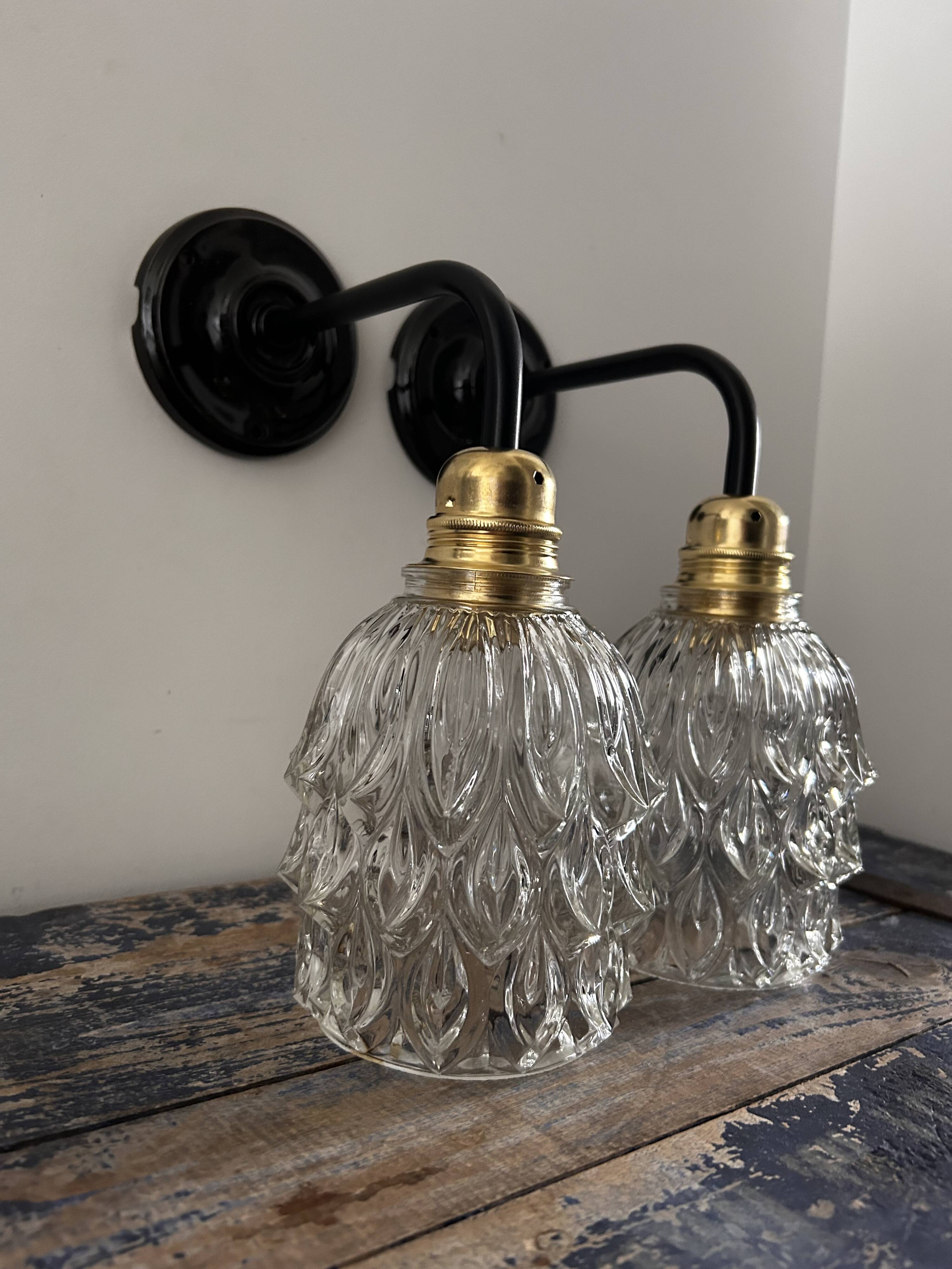 Pair of chiseled glass wall sconces