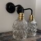 Pair of chiseled glass wall sconces