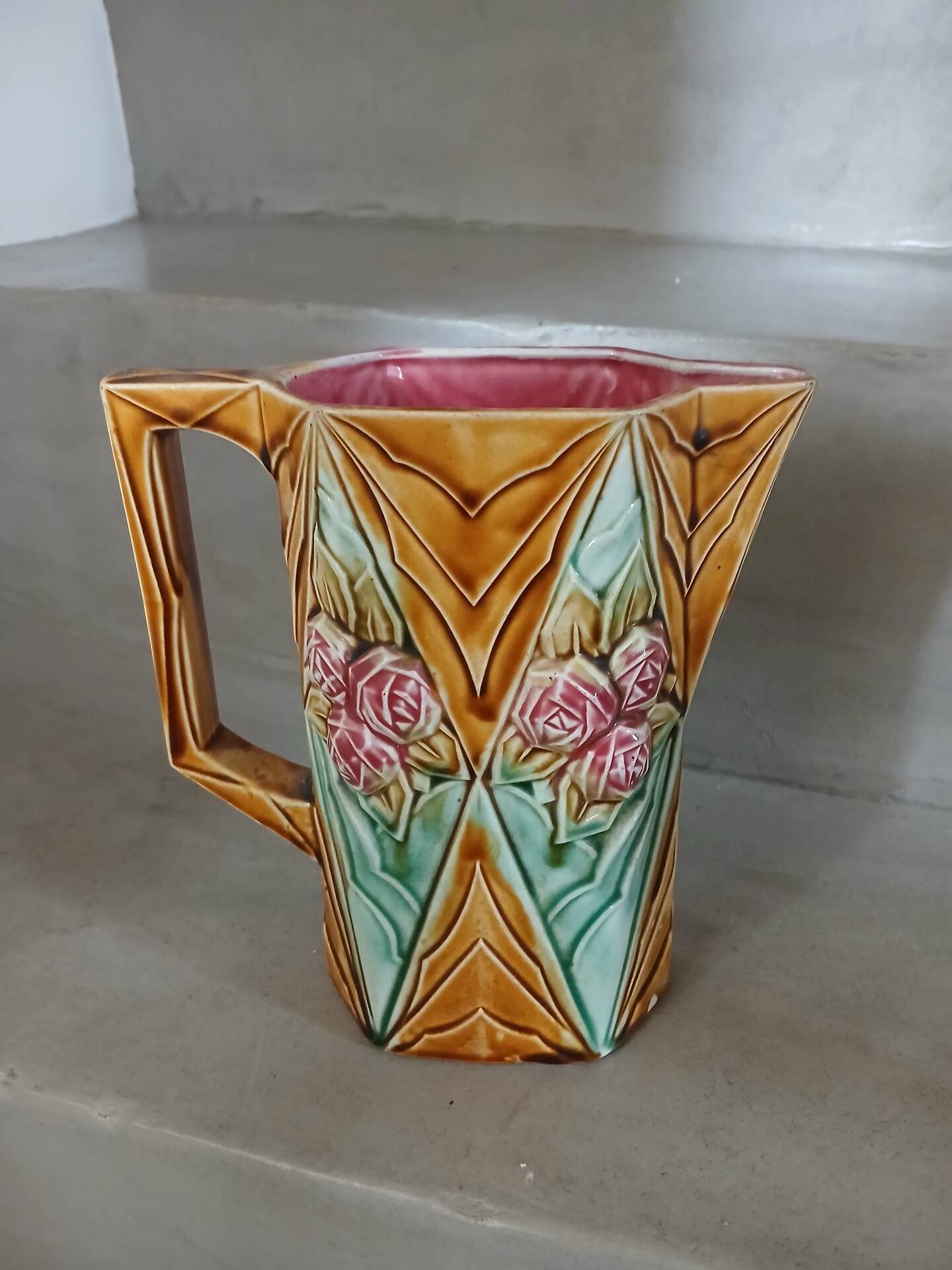 Antique pitcher in Onnaing slipware
