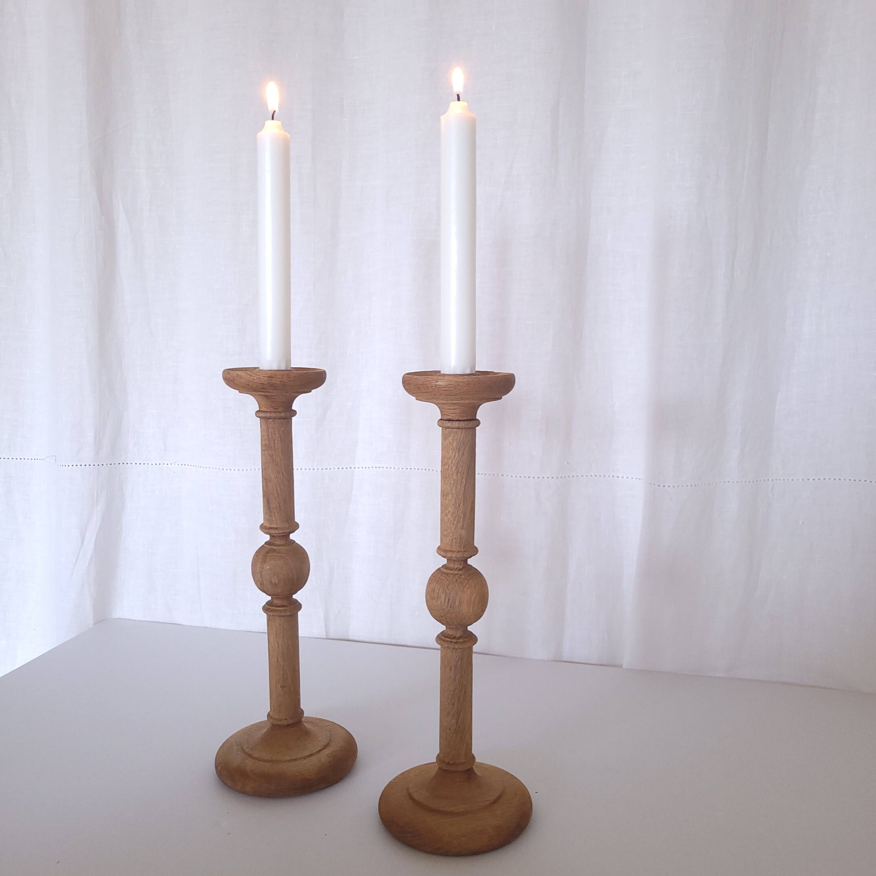 Large carved wooden candlesticks