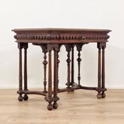 Carved walnut writer's desk in Renaissance style, late 19th century.