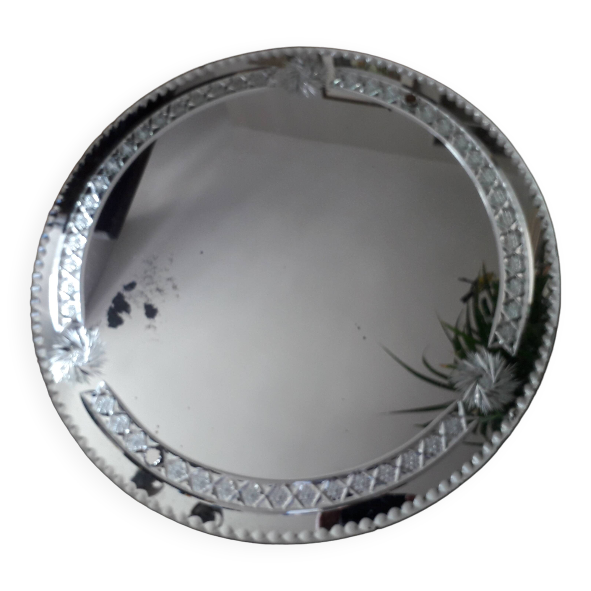 Large old round mirror finely decorated