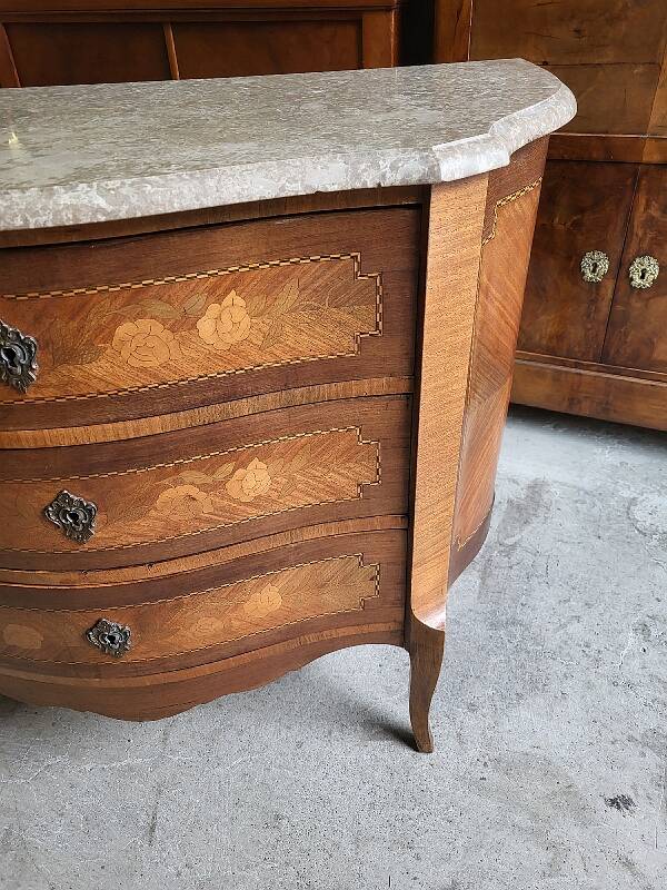 Curved chest of drawers in rosewood and marble marquetry