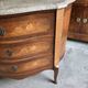 Curved chest of drawers in rosewood and marble marquetry