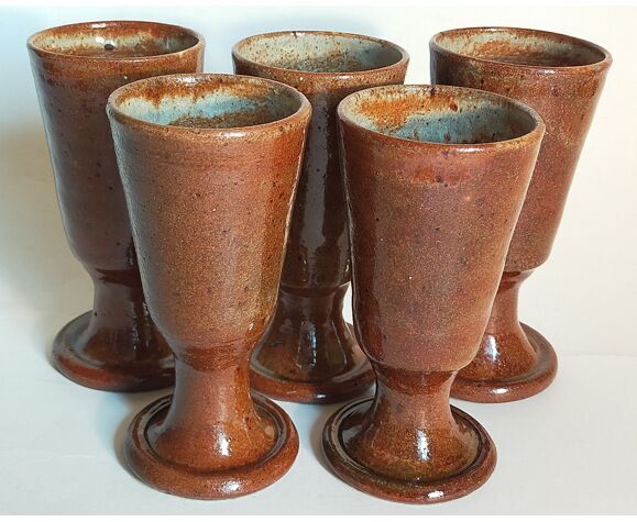 Five ancient potter's mazagrans in enamelled sandstone