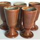 Five ancient potter's mazagrans in enamelled sandstone