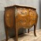 Louis XV style curved chest of drawers in marquetry