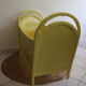 Yellow vintage baby cot