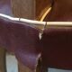 Skai chair binds wine and wooden footpieces and armrests