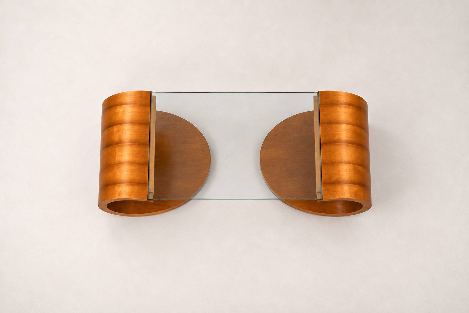 Sculptural coffee table in wood and glass — circa 1970