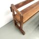 Pair of communal benches in solid oak, 1950s.